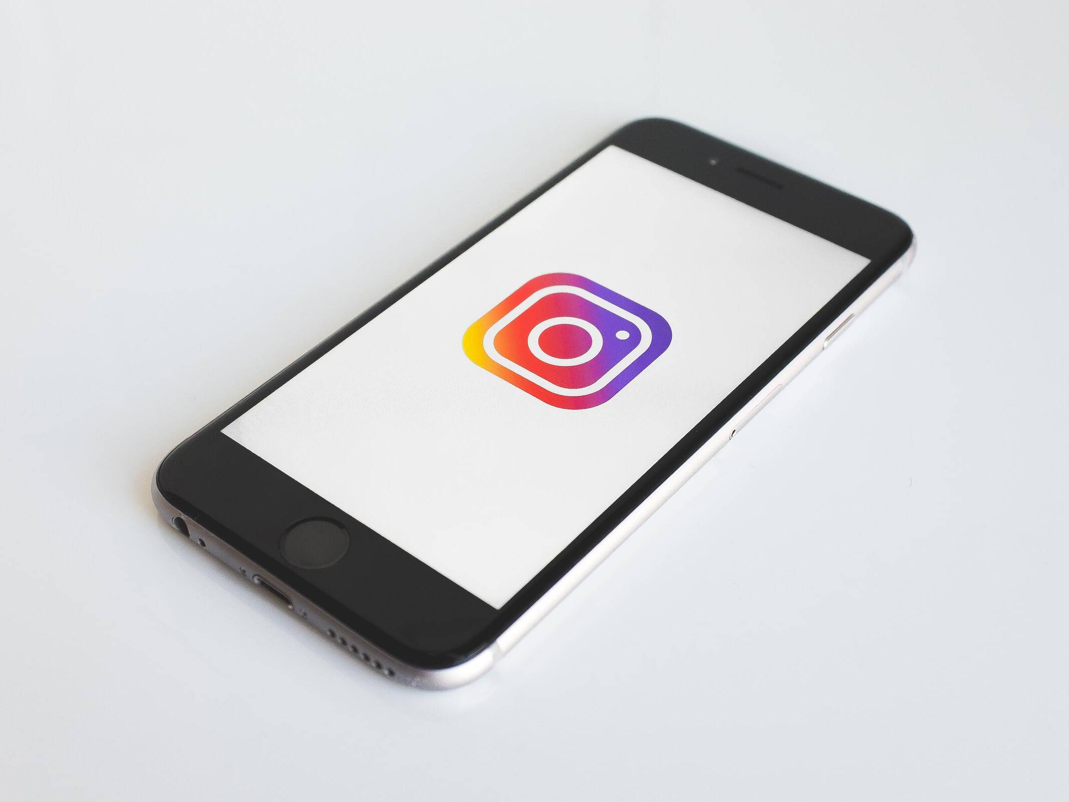 Mobile Phone with Instagram Logo